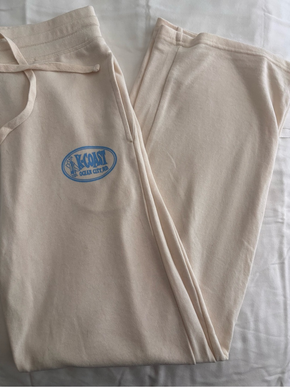 Fabletics Cream Cozy Sweatpants with Small Orange Logo